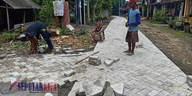 Tingkatkan Aksesibilitas dan Kesejahteraan Warga, Pemdes Walikukun Realisasikan Pavingisasi Jalan