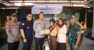 Kapolres Madiun dan Imigrasi Bagikan Bantuan dan Gizi Gratis di SLBN Banjarsari Wetan