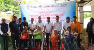 Polres Nganjuk dan PWI Satukan Langkah, Salurkan Kursi Roda dan Sembako Peringati HPN 2026